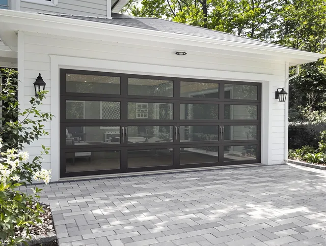Richmond Heights Garage Door Repair design specialist presenting custom garage door options to Richmond Heights homeowner