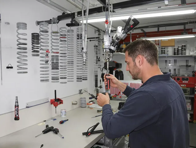 Richmond Heights Garage Door Repair safety certified technician performing precision spring replacement in Richmond Heights